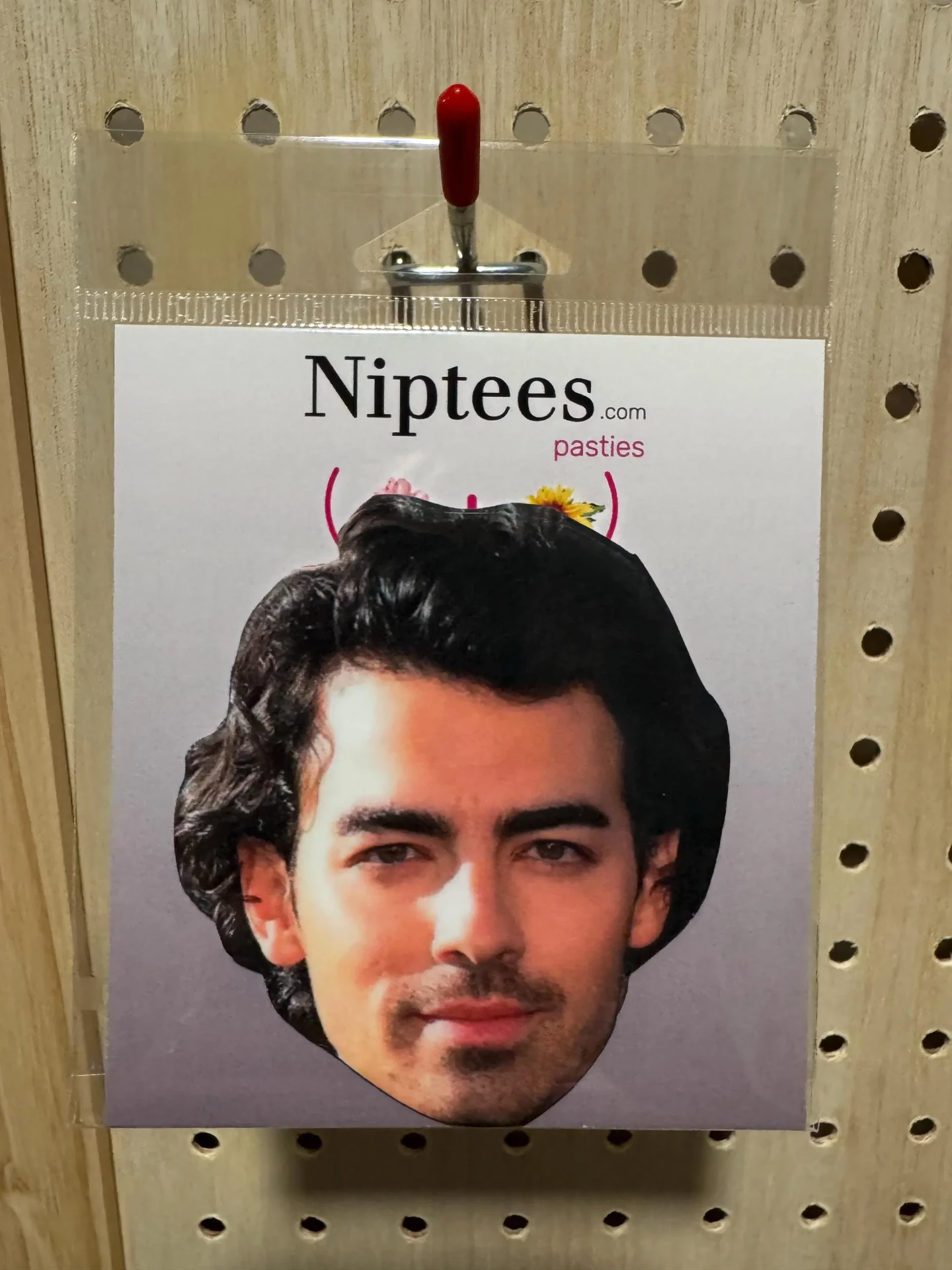 Custom celebrity face pastie on a Niptees backing card