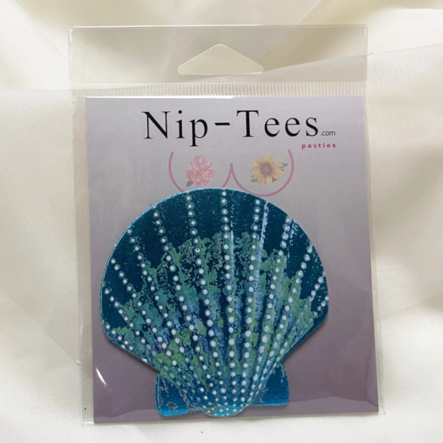 teal-dotted-seashell.webp